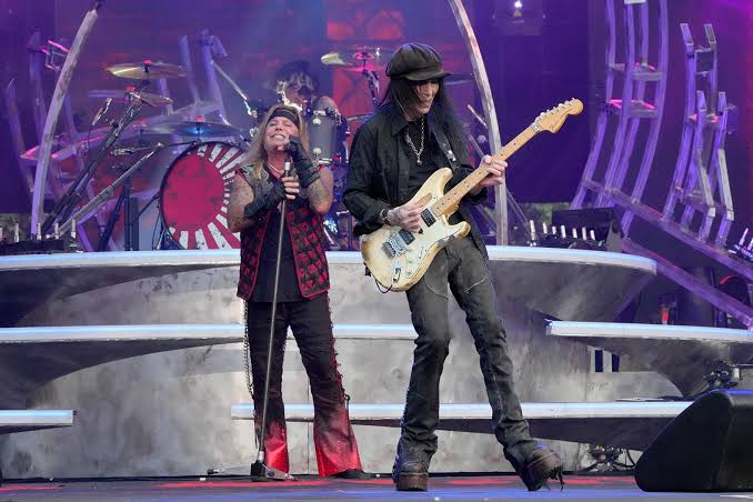 Mick Mars On Stage, Credit: Kevin Mazur, Getty Image