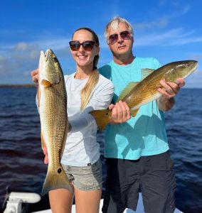 Kelly Young along with her dad fishing 