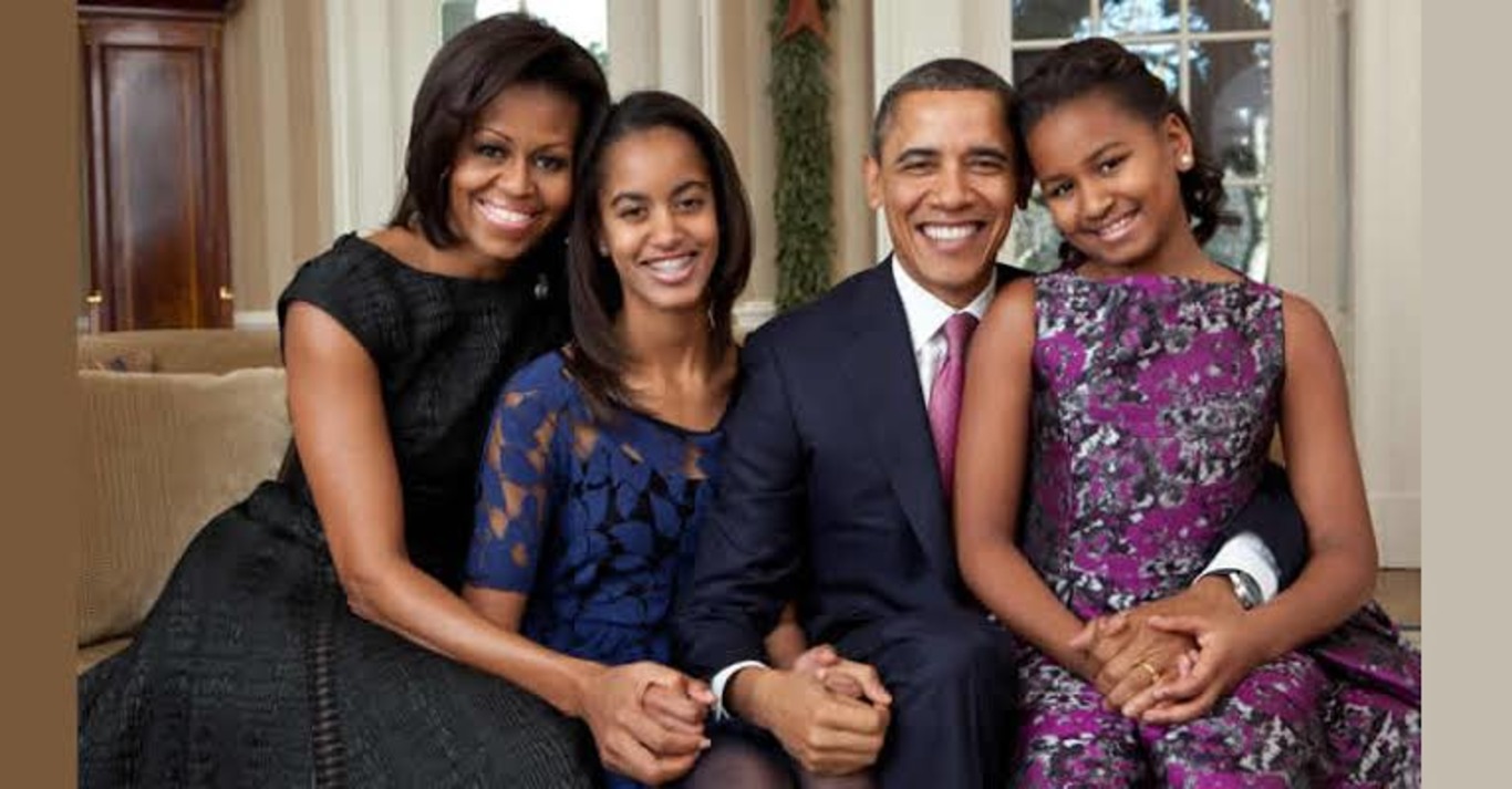 Michelle Obama with Barack Obama and her kids