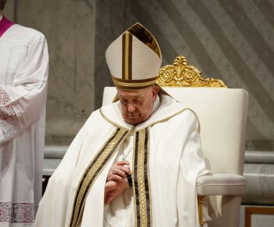 Pope Francis presides over Easter Vigil after sudden absence on Good Friday