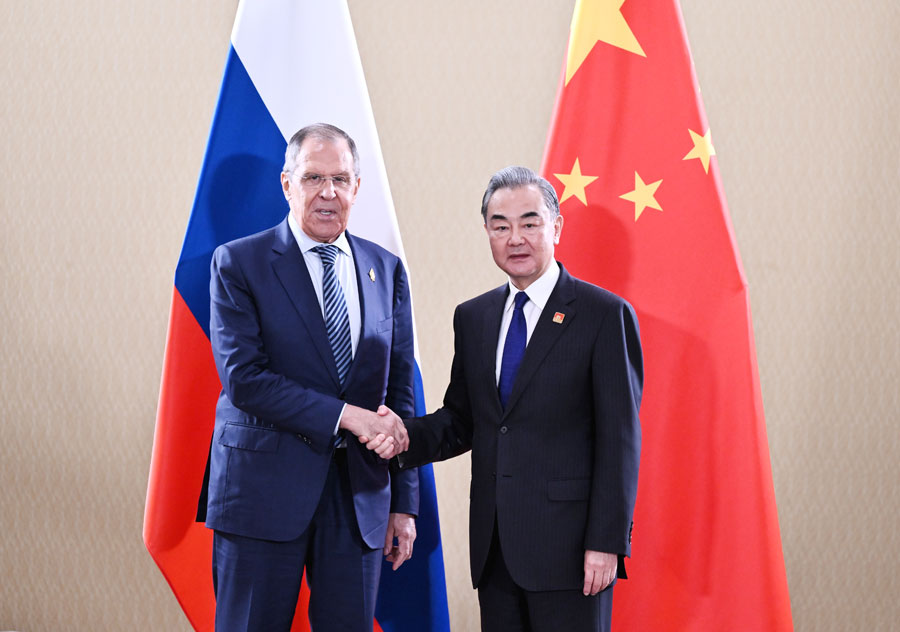 China's Foreign Minister Wang Yi Reaffirms Commitment to Peace, Stands by Relationship with Russia