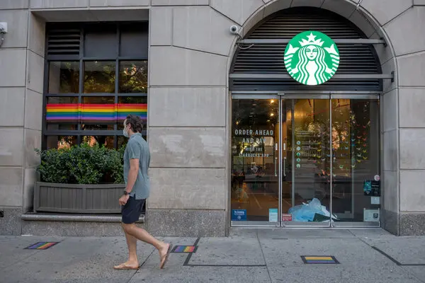 Former Starbucks Employee Alleges Termination Due to Opposition to LGBT Display and Pronoun Policy